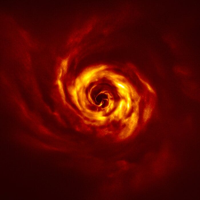 Dust and gas spiral around AB Aurigae