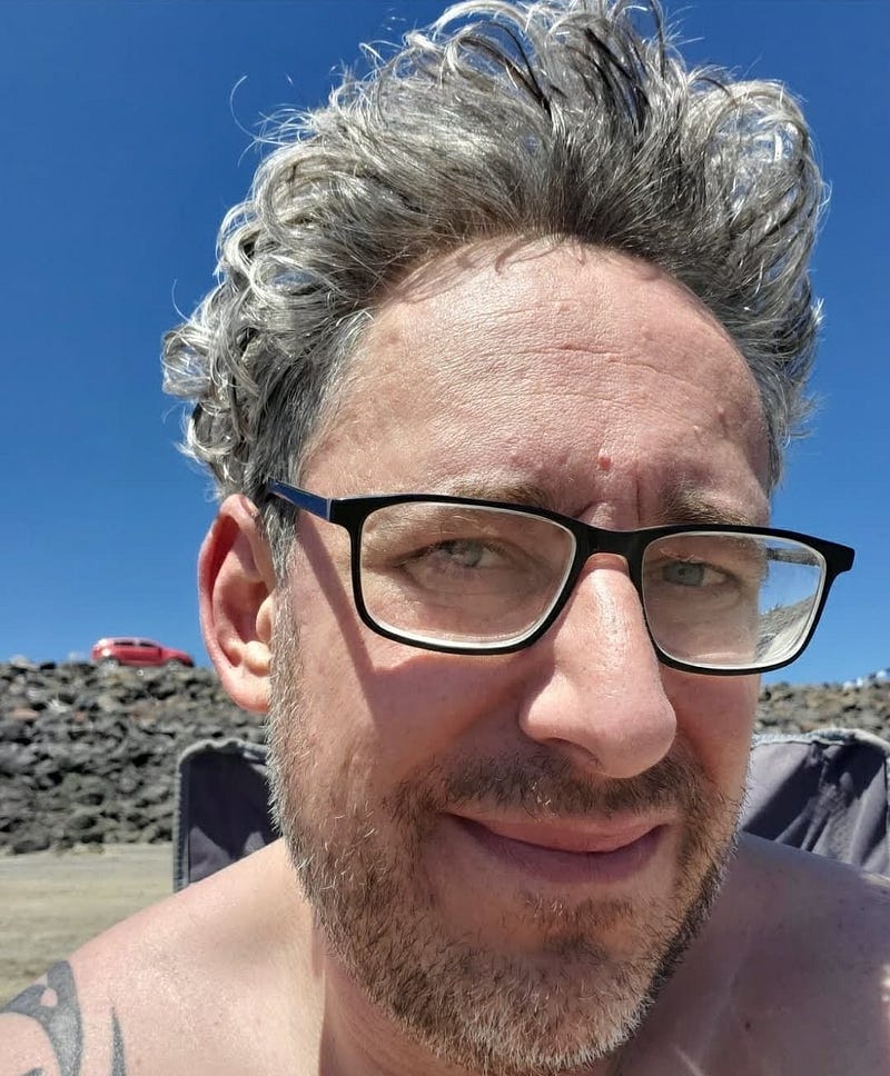 A photo showcasing my hair growth during a beach vacation.