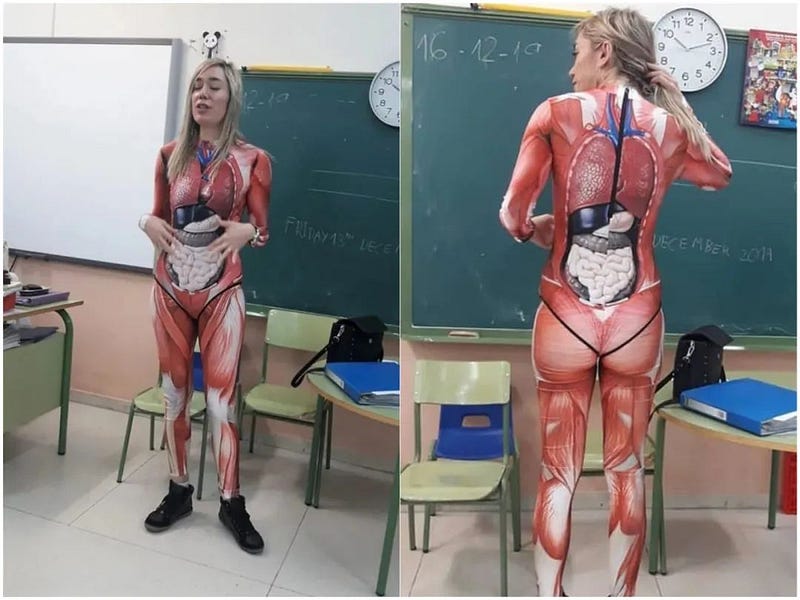 Educator in human organ suit teaching biology