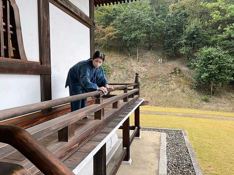 A glimpse of daily chores in a temple setting.