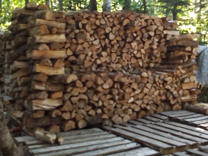 Stacking firewood, a rewarding task